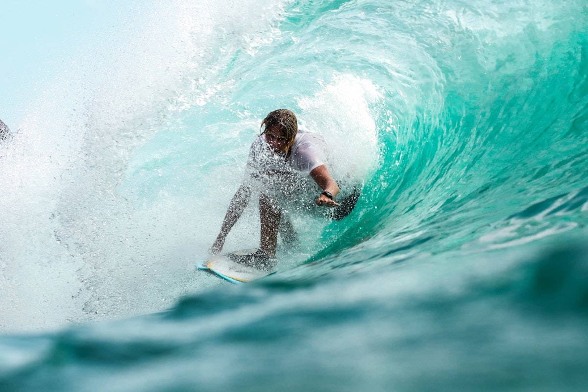 Surfer riding a wave at Batu Bolong, Canggu